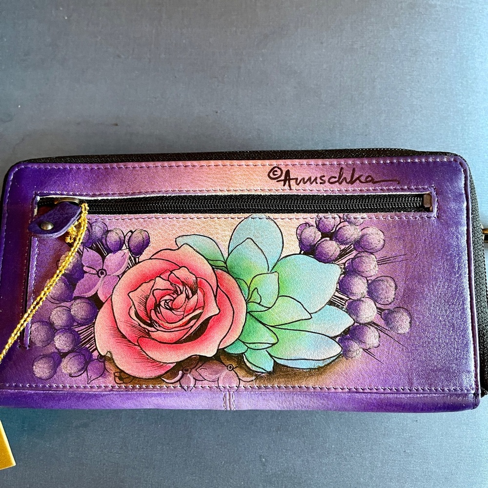 Anuschka hand-painted purple floral wristlet. It holds a large iphone 12 pro max